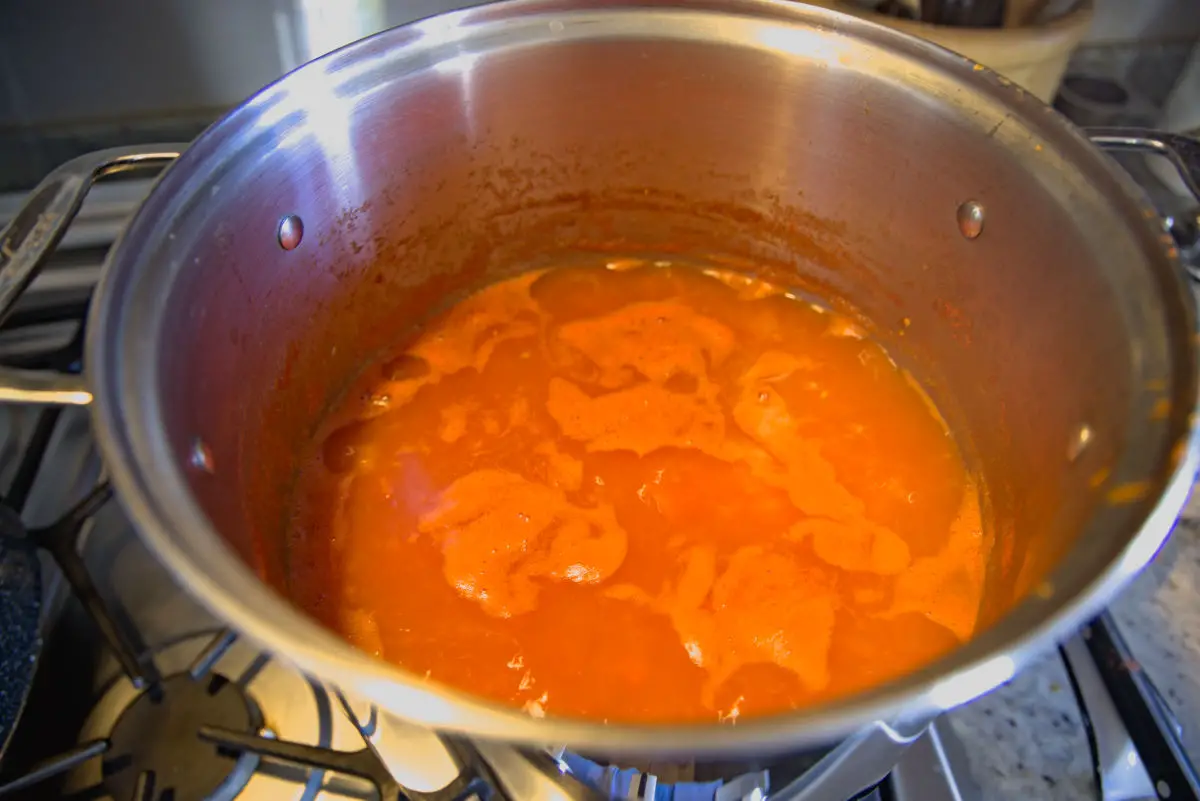 simmering homemade tomato paste