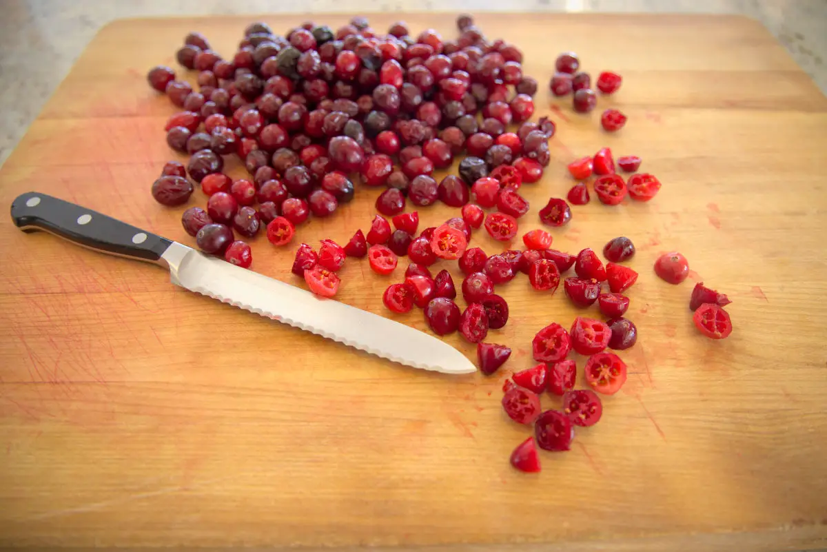fresh cranberries halved to be dried