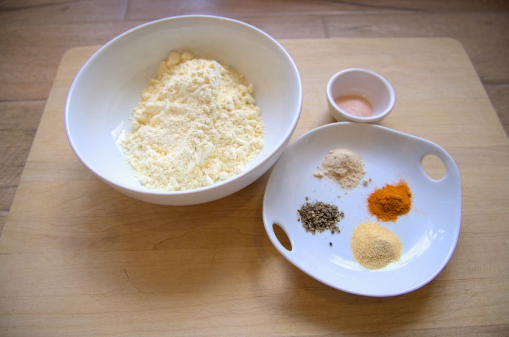 chickpea flour with seasonings to whisk for fried pickle batter