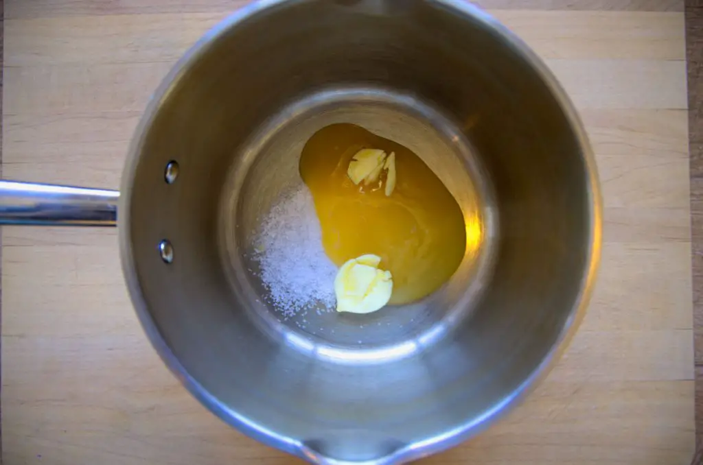 honey, garlic, and salt for pickled jalapeño brine