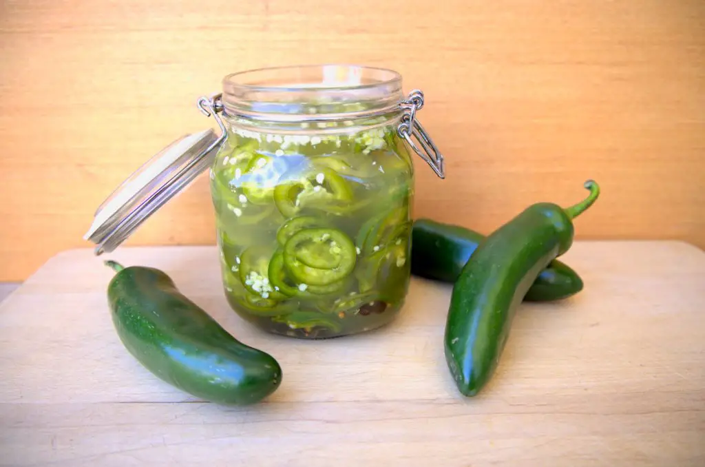allow jalapeños to pickle in fridge